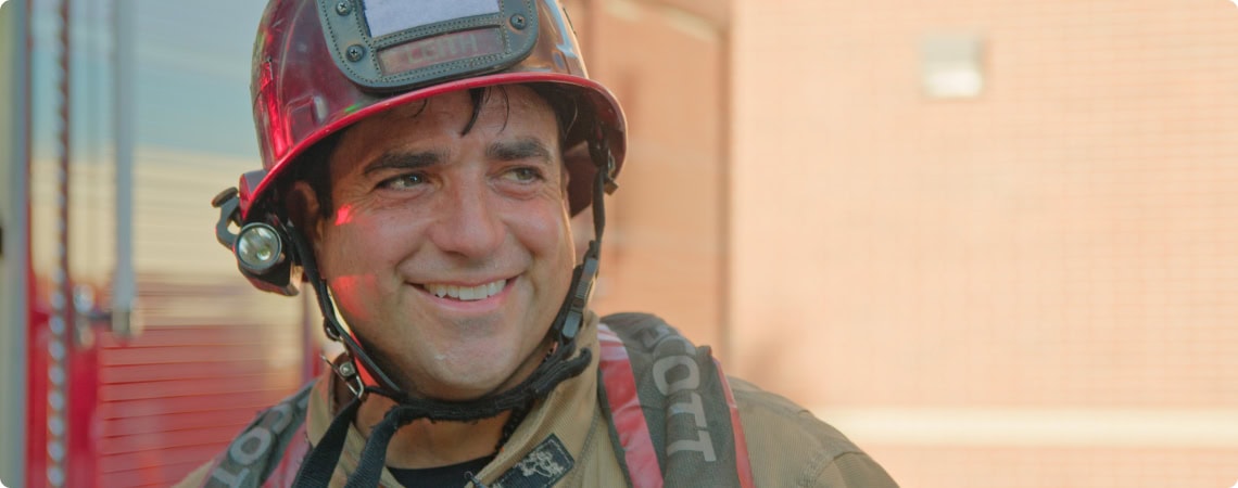 Captain Andrew Leith in his fire helmet